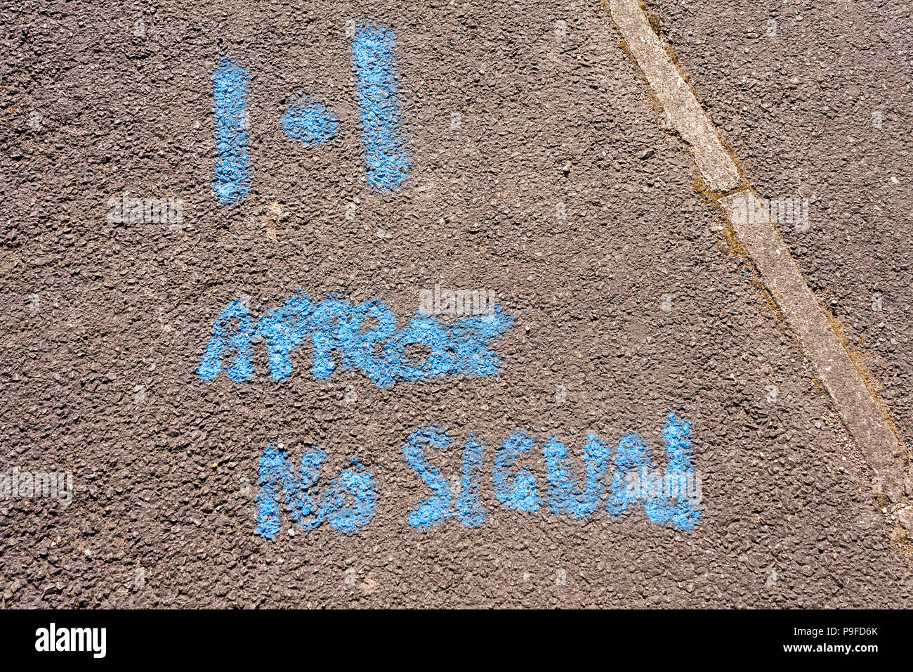 Spray painted markings left on road by contractors to indicate