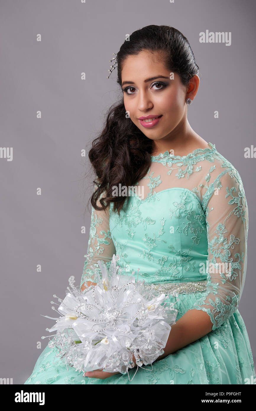 Young women in festive dress celebrate their 15th birthday, the Quinceanera  or Quince, Stock Photo, Picture And Rights Managed Image. Pic. IBR-4346005
