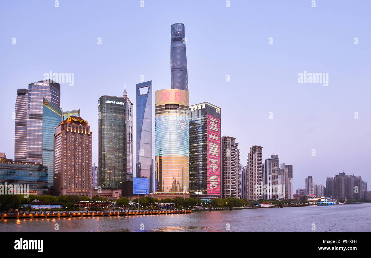 Early evening view of high rises in the new Pudong district of Shanghai, China. Stock Photo
