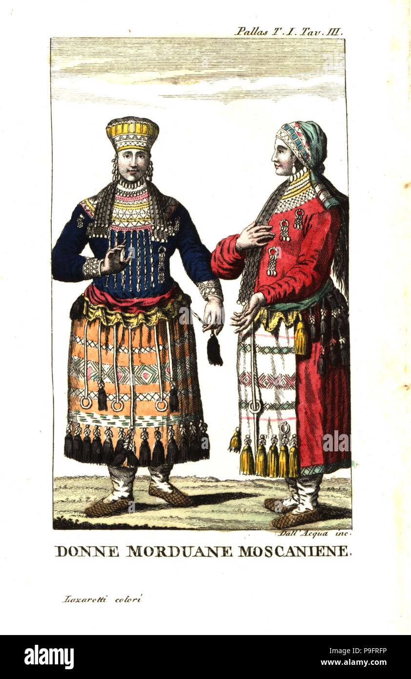 Women of the Mordvin Moksha people in traditional costume of embroidered skirts and many accessories. Illustration from Peter Simon Pallas’ Travels through the southern provinces of the Russia Empire, 1812. Copperplate engraving by Dell'Acqua handcoloured by Lazaretti from Giovanni Battista Sonzogno’s Collection of the Most Interesting Voyages (Raccolta de Viaggi Piu Interessanti), Milan, 1815-1817. Stock Photo