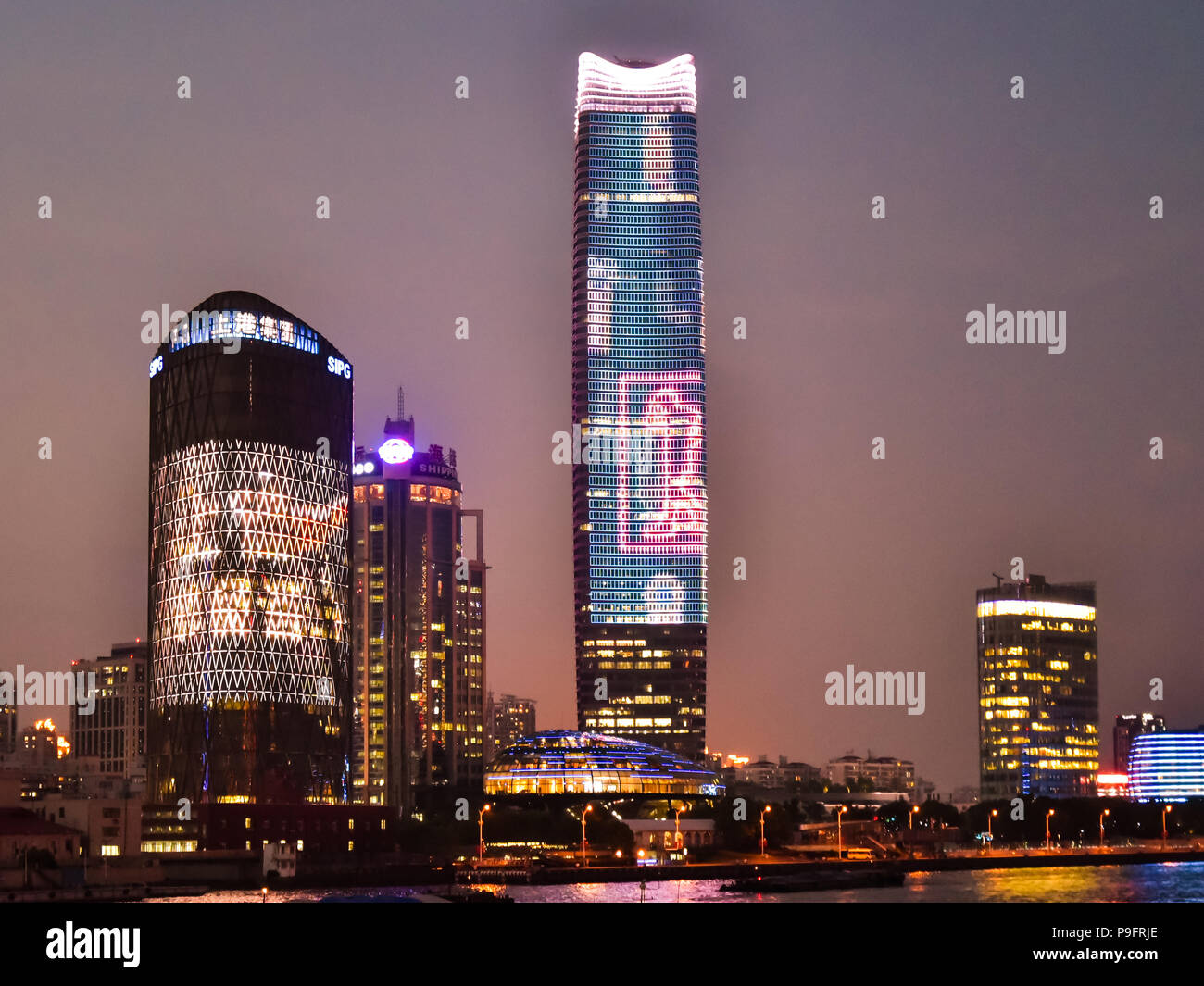 Early evening view of high rises in the new Pudong district of Shanghai, China. Stock Photo