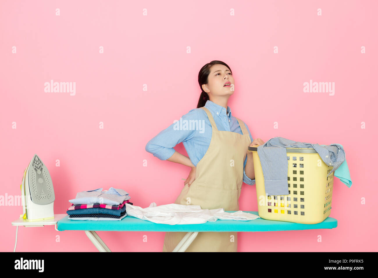 beautiful housewife mom feels painful after she does too much housework