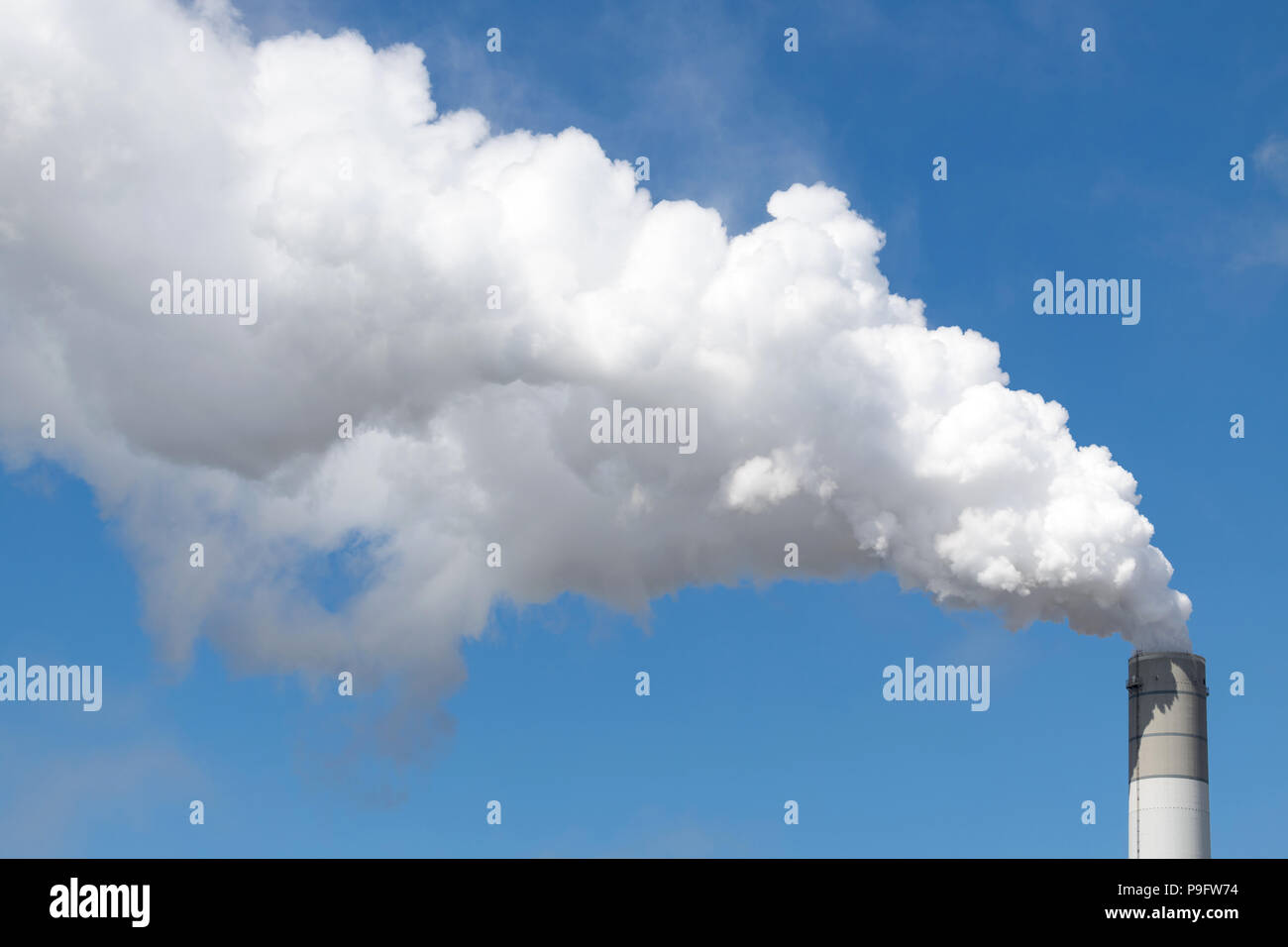 smoking chimney of a coal-fired power plant Stock Photo