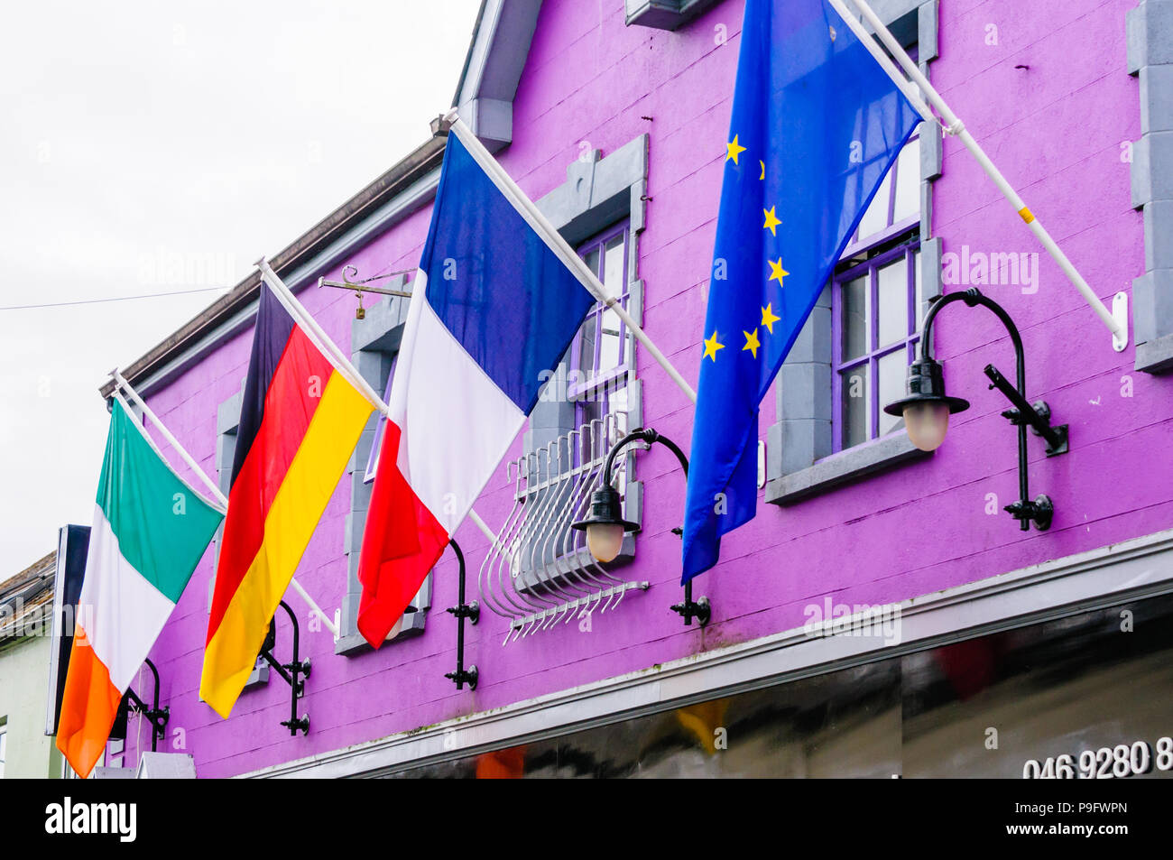 Flags of Ireland, Germany, France and the European Union outside a bar in Ireland. Stock Photo