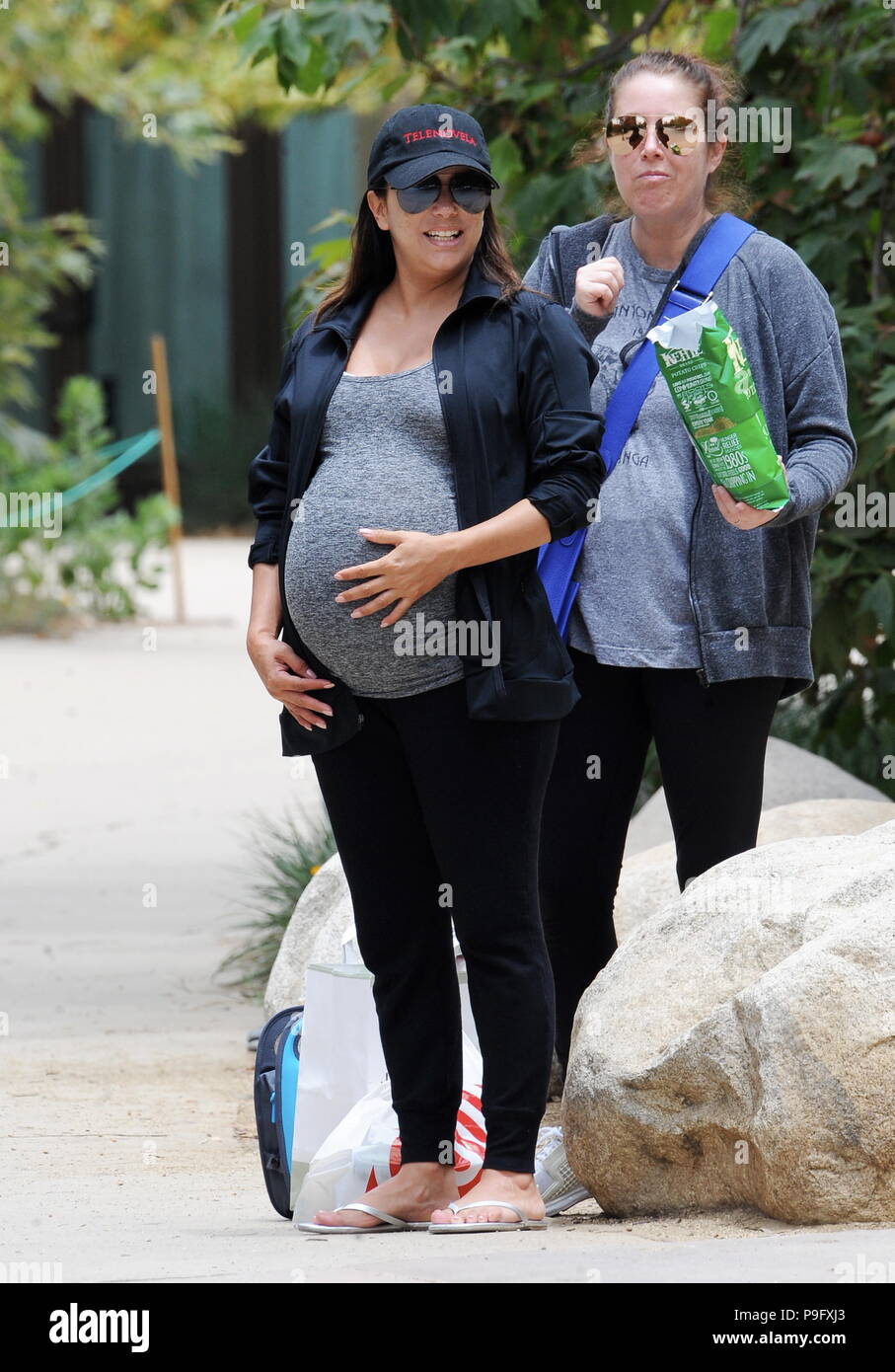 Pregnant Eva Longoria surrounds herself with close friends the day