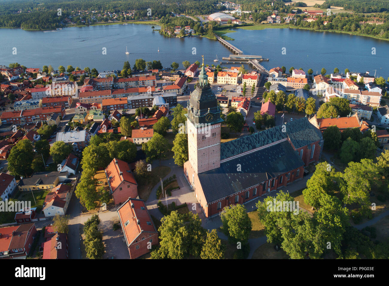 Strangnas, Sweden - July 16, 2018: Aerial view of the scandinavian brick gothic Strangnas cathedral surronded by the town. Stock Photo