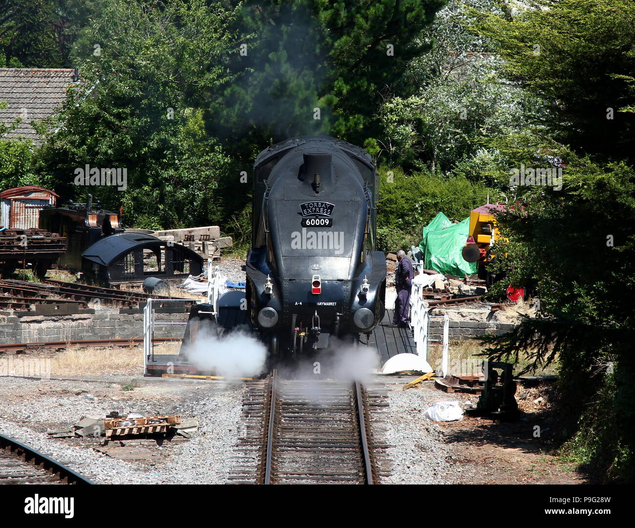 Churston, Devon, England: The 'Union of South Africa' (60009) on turntable. Union of South Africa is an LNER Class A4 steam locomotive Stock Photo