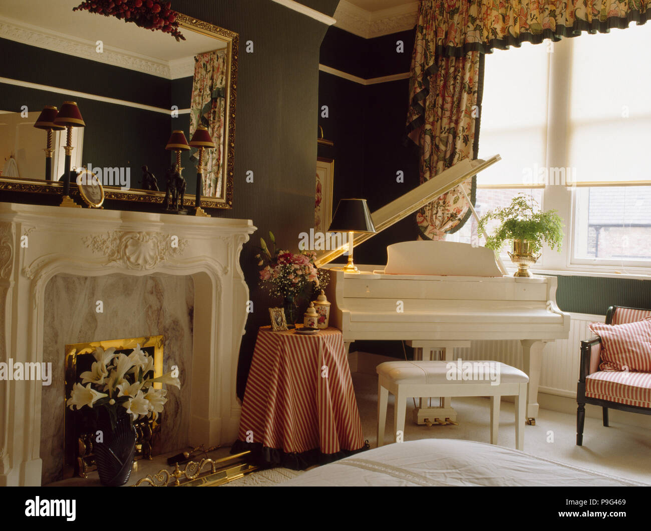 White piano in traditional living room Stock Photo - Alamy