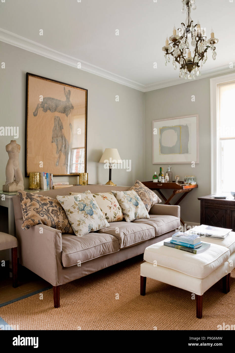 Floral Linen Cushions On Beige Sofa In Pale Grey Living Room
