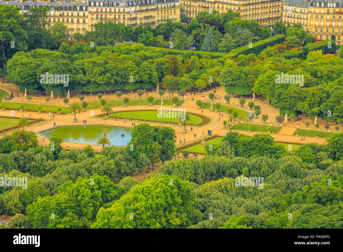 Closeup of Le Jardin du Luxembourg gardens from panoramic terrace of Tour Montparnasse. Aerial view of Paris urban public park, and french style gardens of residence palace of the Senate President. Stock Photo