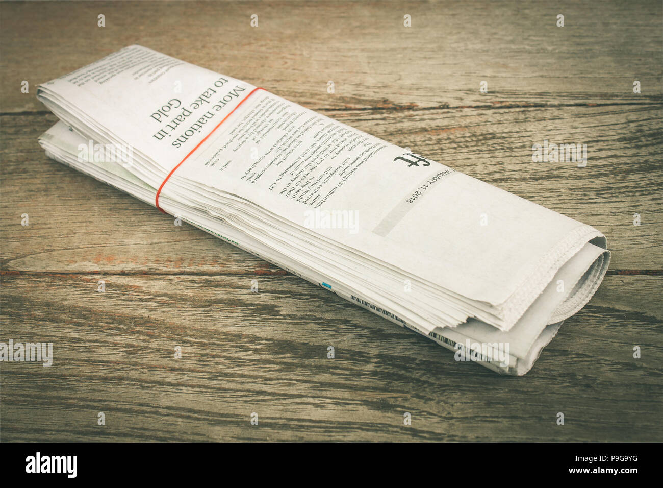 Newspaper on Wood Concept about Journalist or Business. Foreign Newspaper  background Stock Photo - Alamy