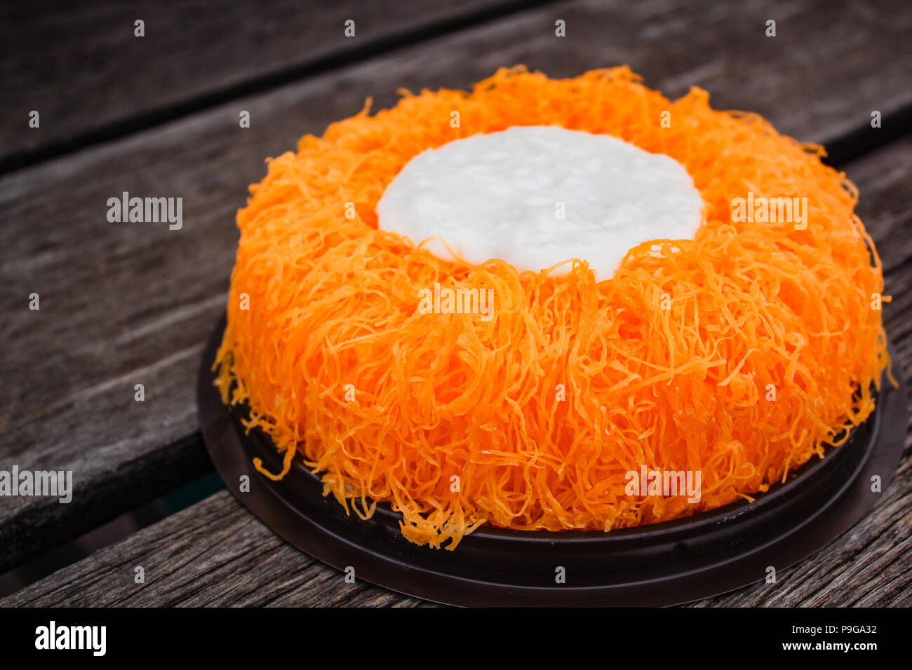 Gold Egg Yolk Thread Cakes or Cake Foi Tong Lava Cake, Thai cake. Stock Photo