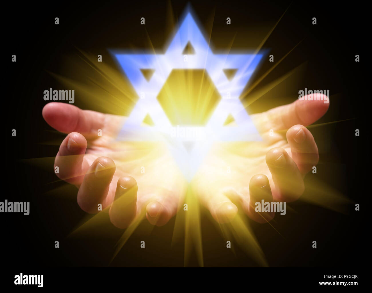 Hands cupped and holding or showing the Star of David. Magen David or Seal of Solomon with bright, glowing, shining light. Concept for Judaism, Jew, H Stock Photo