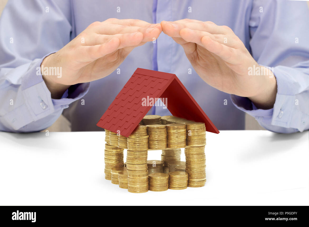 house, coin, hand Stock Photo