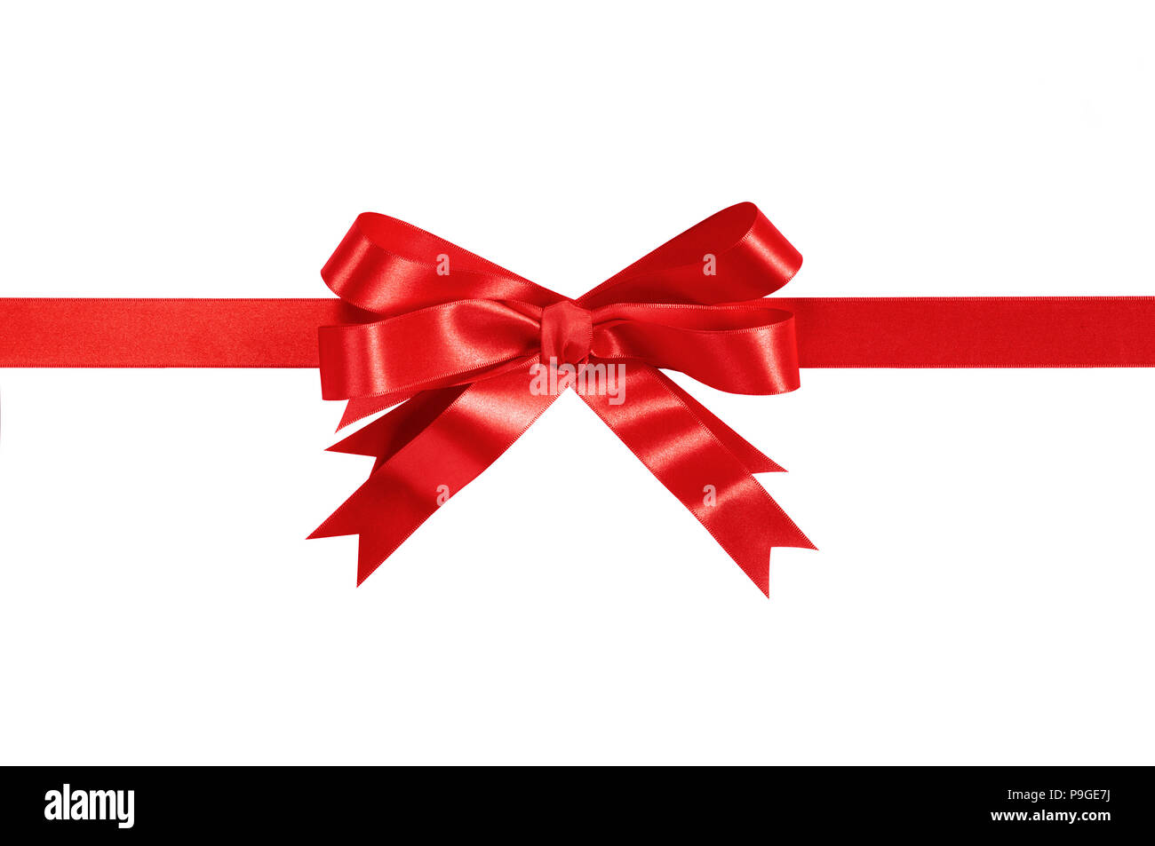 A gift wrapped in plain red paper with a raffia bow isolated on a white  background Stock Photo - Alamy