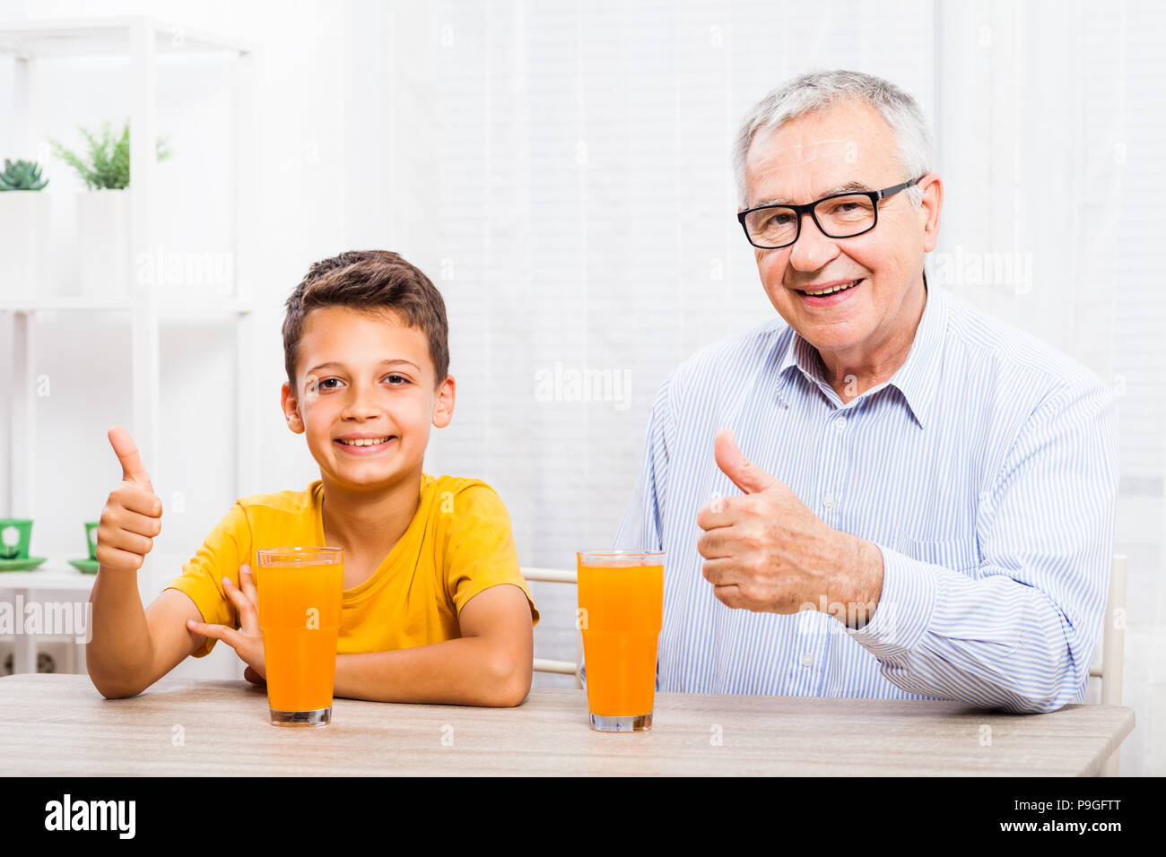 Senior Man Drinking Orange Juice High Resolution Stock Photography And Images Alamy