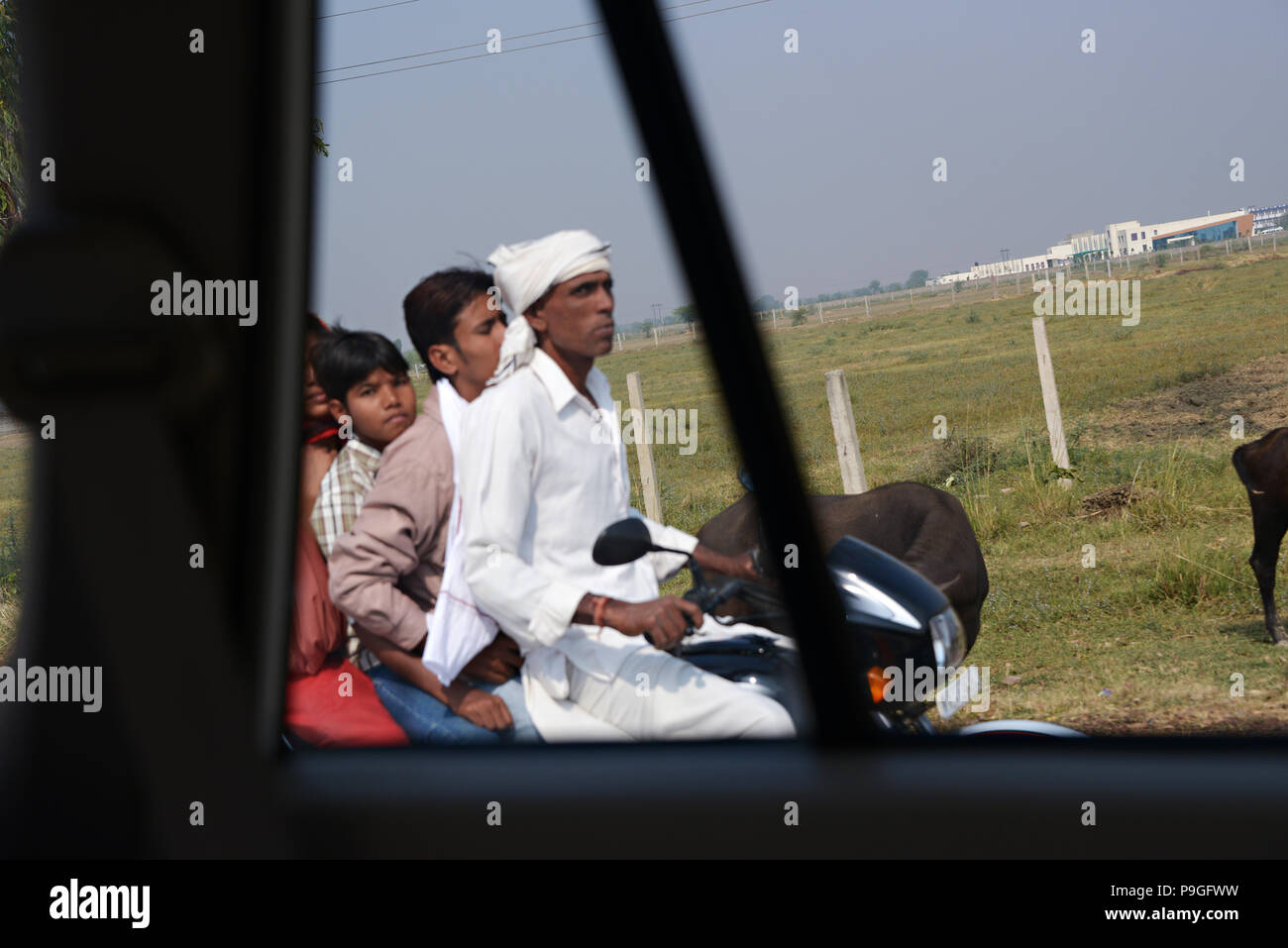 Street scenes of real life in Delhi India, photographed from a moving vehicle Stock Photo