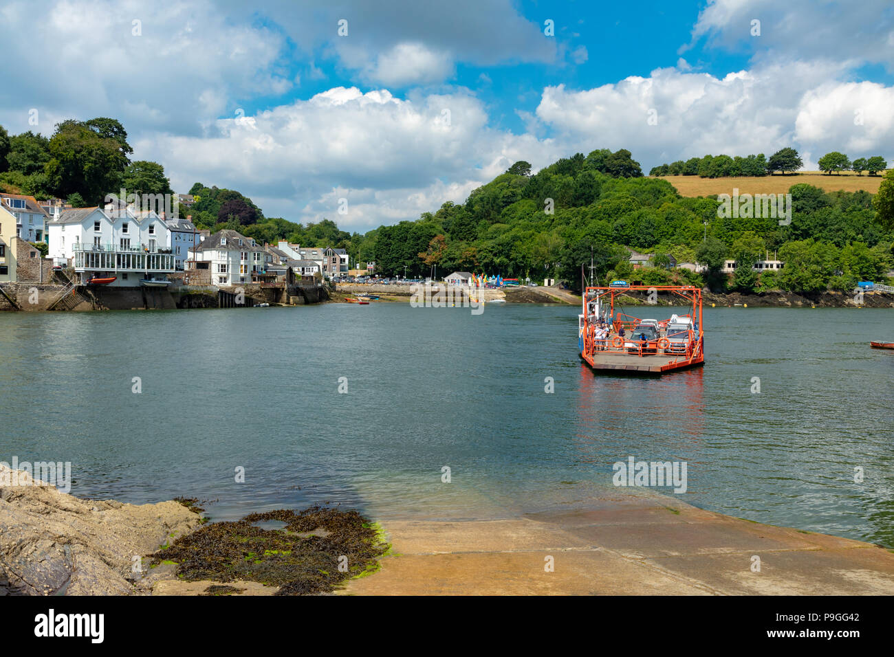 Fowey Cornwall England July 14, 2018 View across the River Fowey from Bodinnick, showing the car ferry Stock Photo