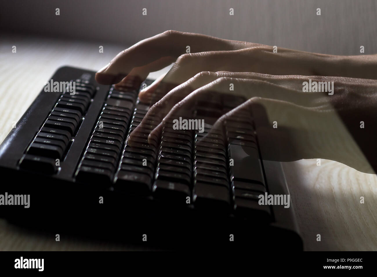 the hands of hackers Stock Photo
