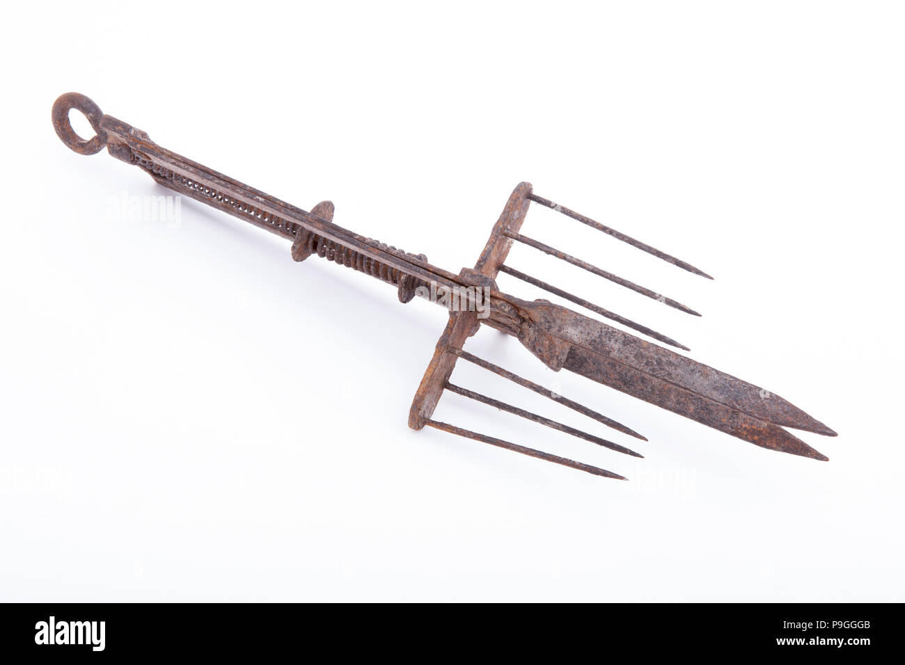 Old mole trap designed to impale a mole on its spikes when it was triggered. This was known as the Anglo Impassable mole trap and research would indic Stock Photo