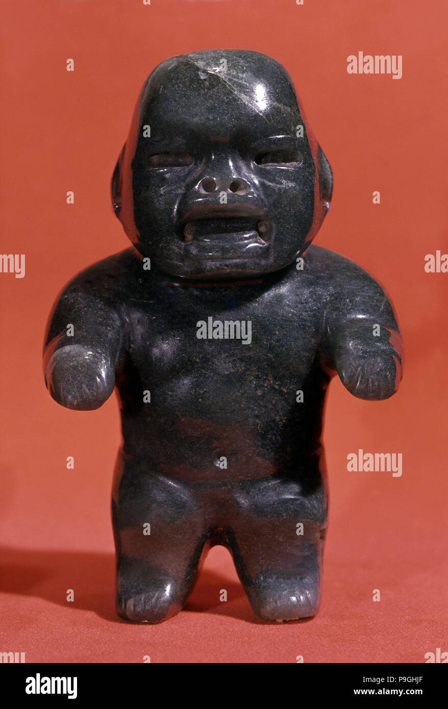 Jade figurine, probably a child although the Olmecs used to represent adults with childlike featu… Stock Photo
