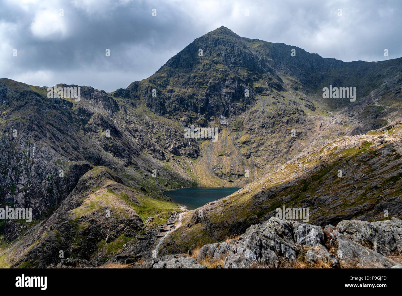 The east face of Snowdon, the highest mountain in Wales during summer with Llyn Glaslyn at the base. Stock Photo
