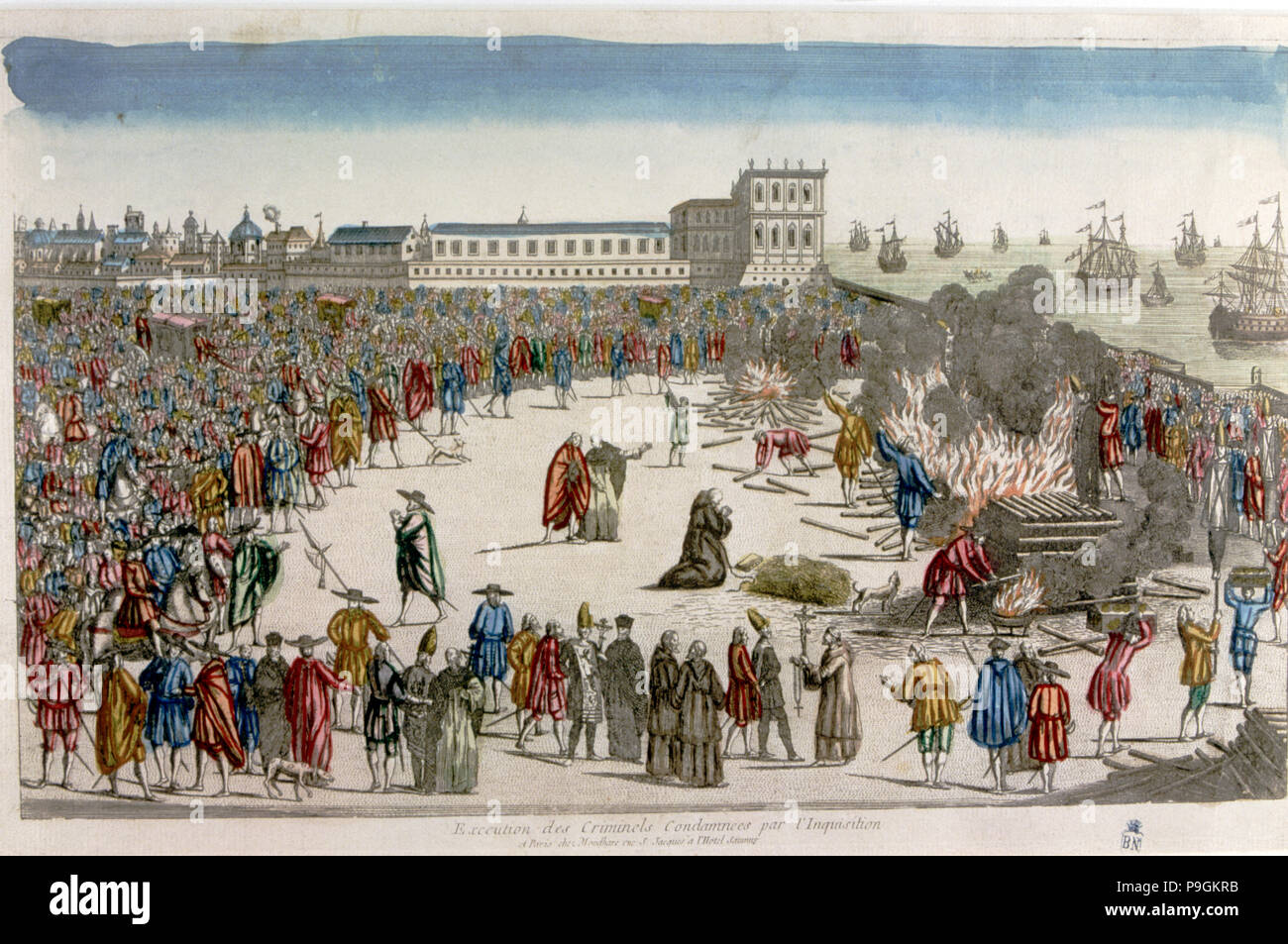 Square with the audience watching an execution 'The quemadero', colored engraving. Stock Photo