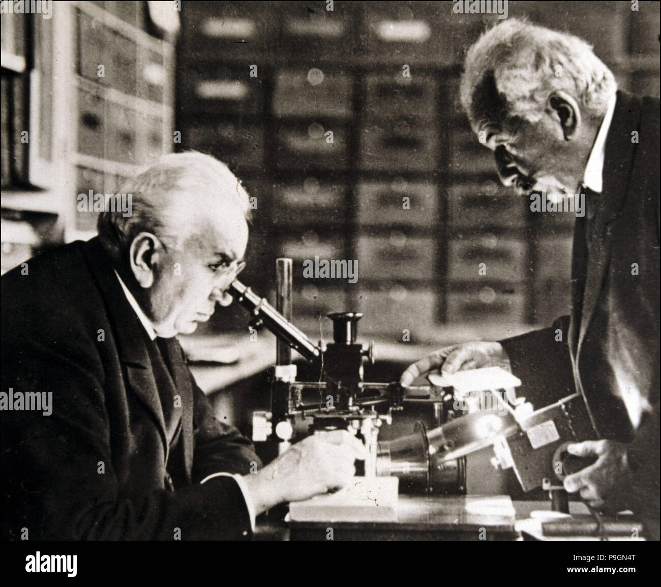 Louis and Auguste Lumière (1864-1948 and 1862-1954), French chemists and biologists in their labo… Stock Photo