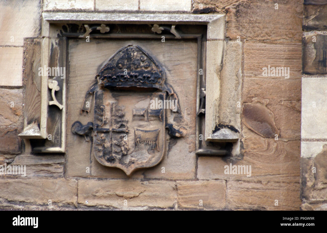 Coat of Arms Crest of a Bishop of Durham on a Stone Wall Stock Photo