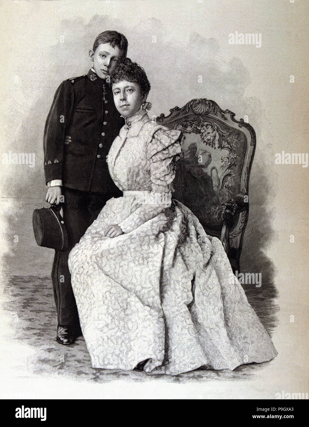 The King Alfonso XIII with his mother Regent Maria Cristina of Hapsburg in 1898, Madrid, engravin… Stock Photo