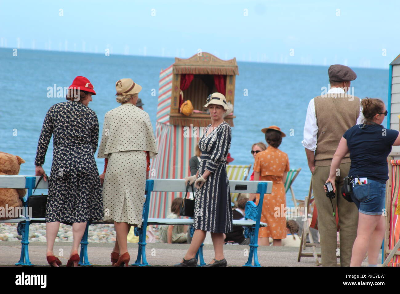 Andy Goddard Directing Six Minutes To Midnight On Llandudno Promenade Wales Stock Photo Alamy
