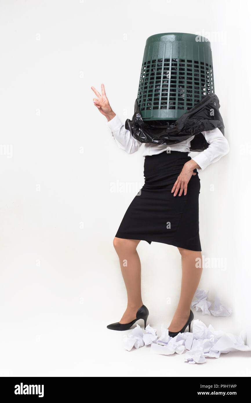 Silly girl with trash bin on her head Stock Photo Alamy