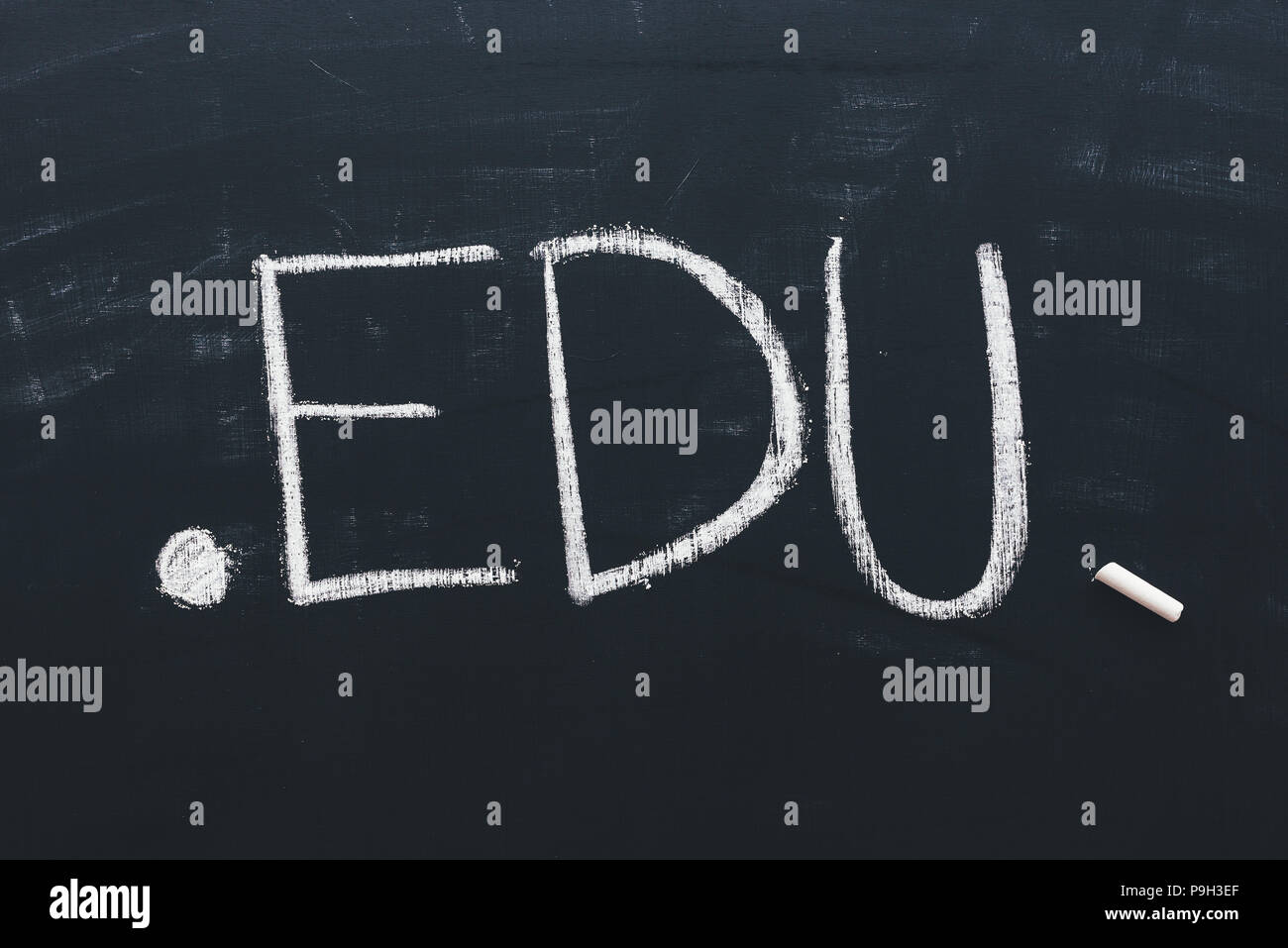 Edu internet domain for educational institutions, conceptual image of text written in chalk on school blackboard Stock Photo