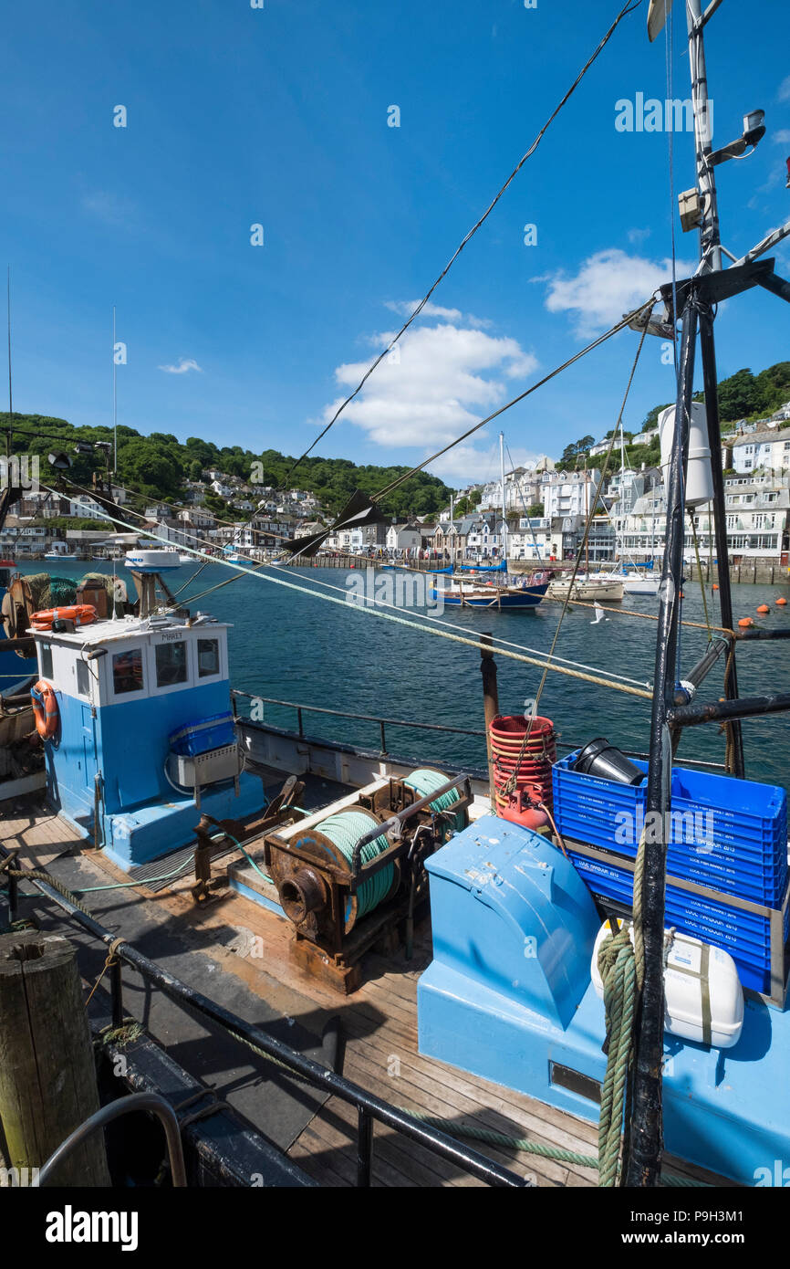 Boats moored in the harbour at the fishing port of Looe, Cornwall ...
