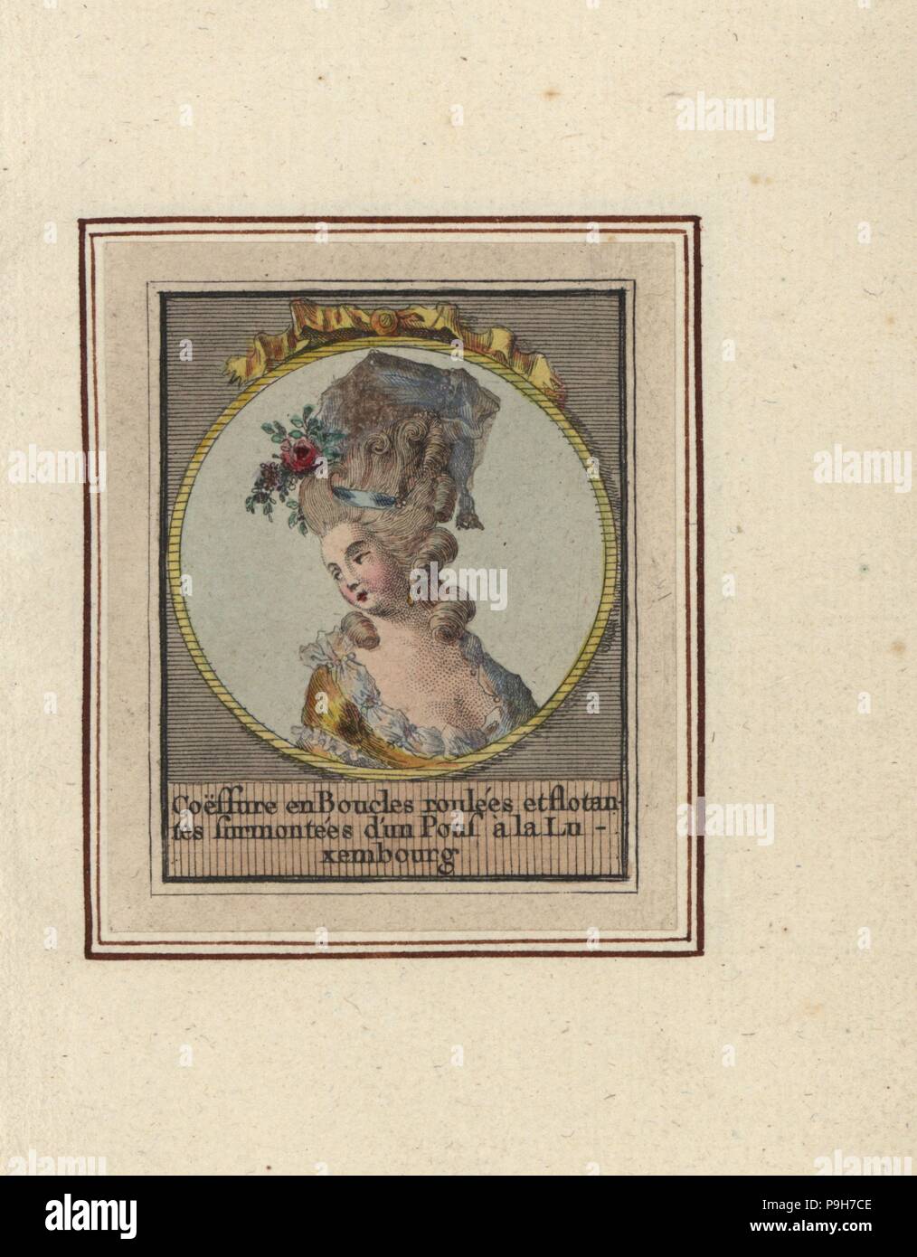 Hairstyle with ringlets and curls surmounted by a Luxembourg pouf. Coeffure en Boucles roulees et flotantes surmontees d’un Pouf a la Luxembourg. Handcoloured copperplate engraving by an unknown artist from an Album of Fashionable Hairstyles of 1783, Suite des Coeffures a la Mode en 1783, Esnauts et Rapilly, Paris, 1783. Stock Photo