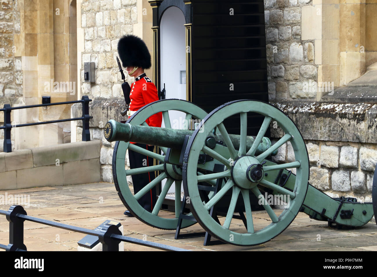 A member of the Queen's Guard stands sentinal at the Tower of London in London, England. Stock Photo