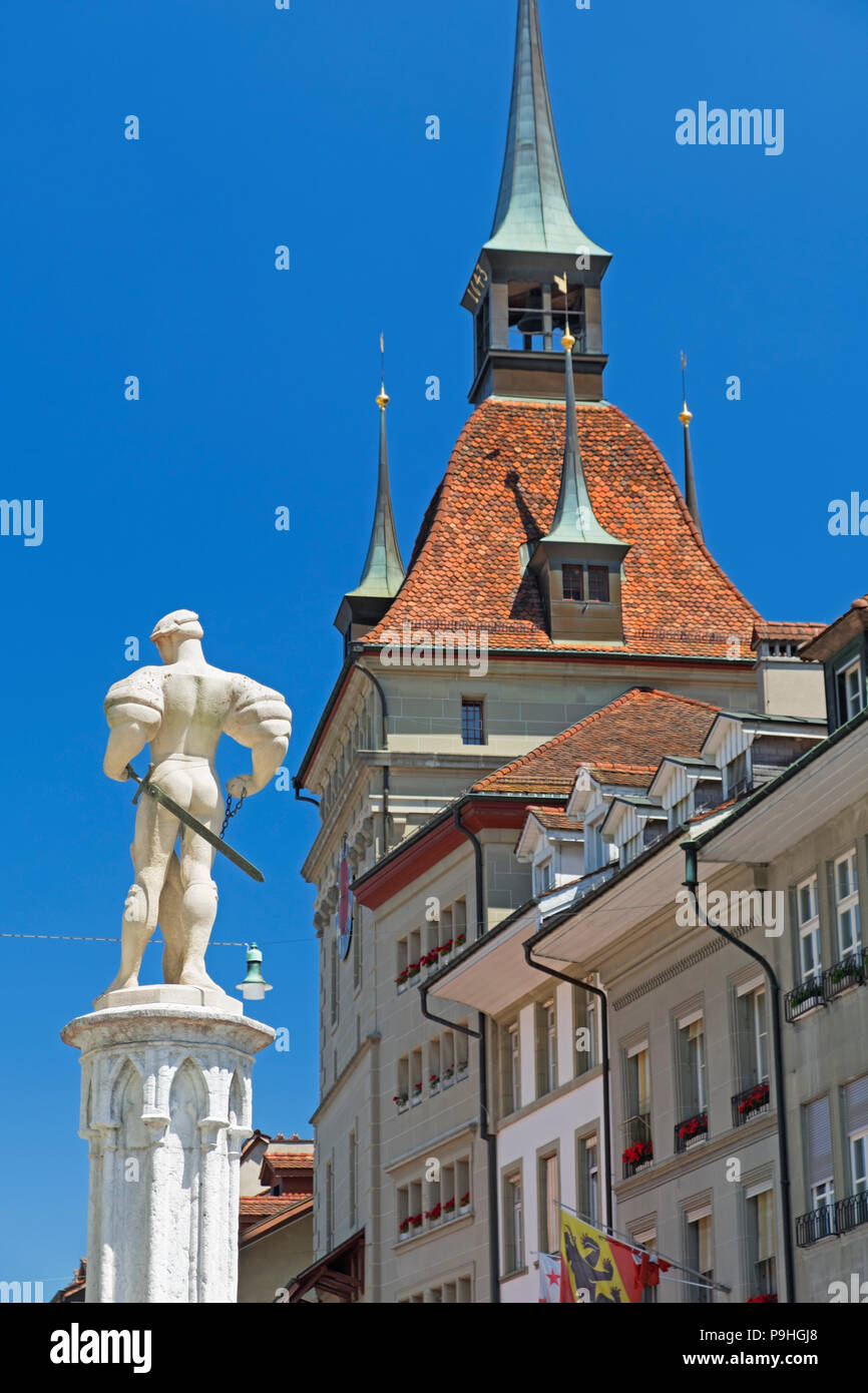 Bärenplatz statue and Käfigturm Prison Tower Old Town Bern Switzerland Stock Photo