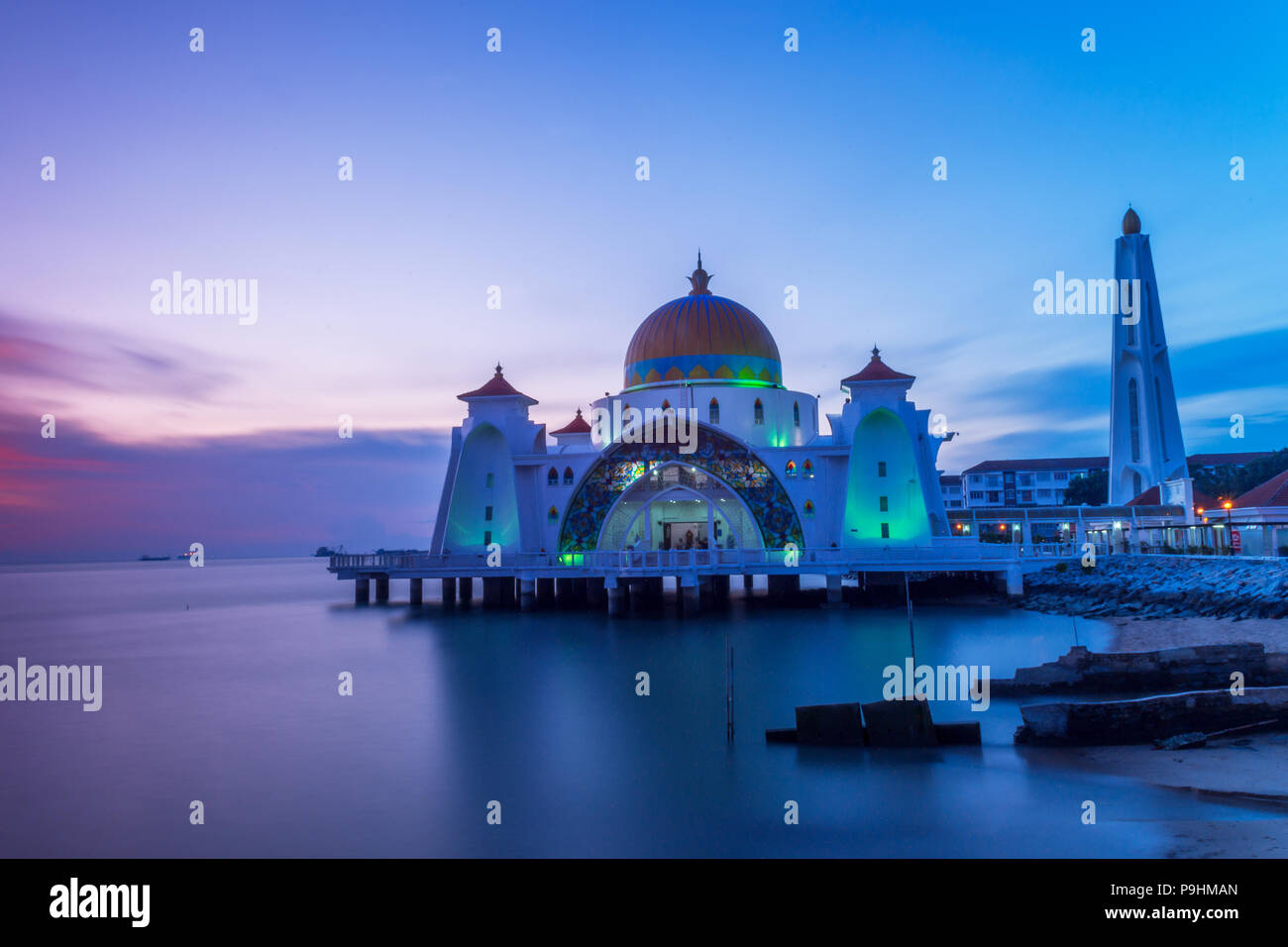 Melaka Straits Mosque, during sunset Stock Photo - Alamy