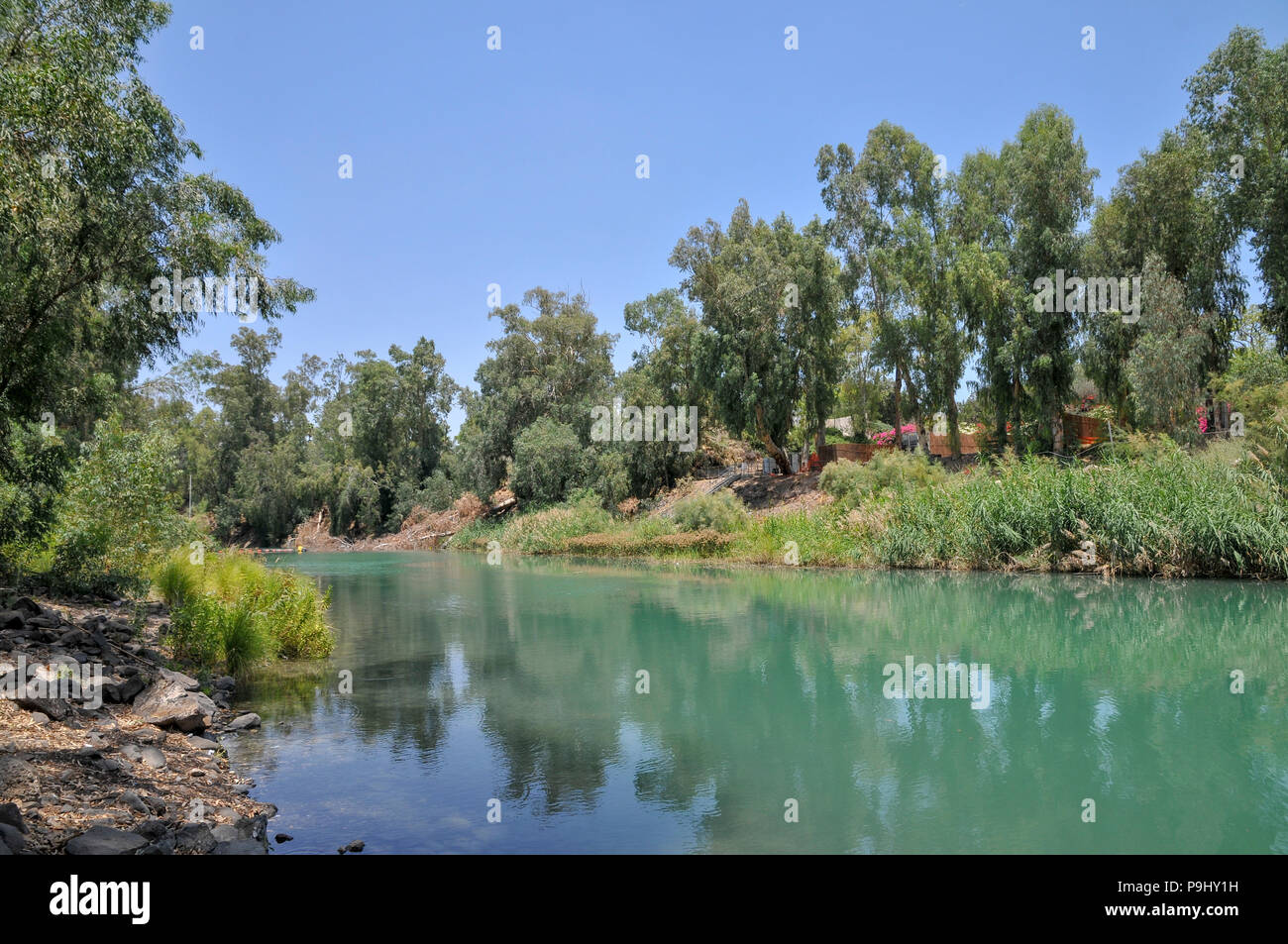 Picnic and camping site on the Southern Jordan River as it exits the Sea of  Galilee, Israel Stock Photo - Alamy