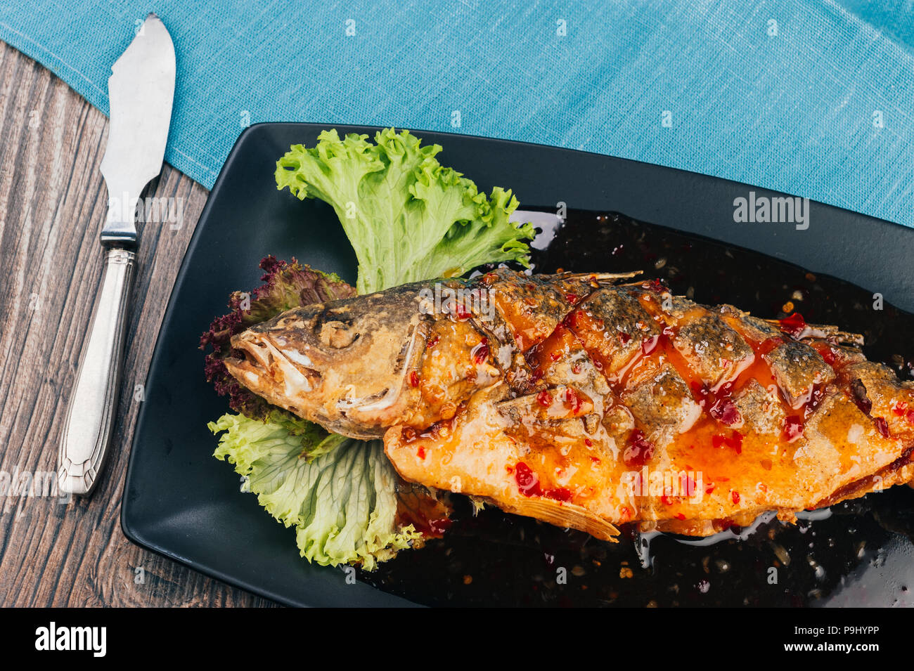 Healthy sea bass fish with green salad Stock Photo Alamy