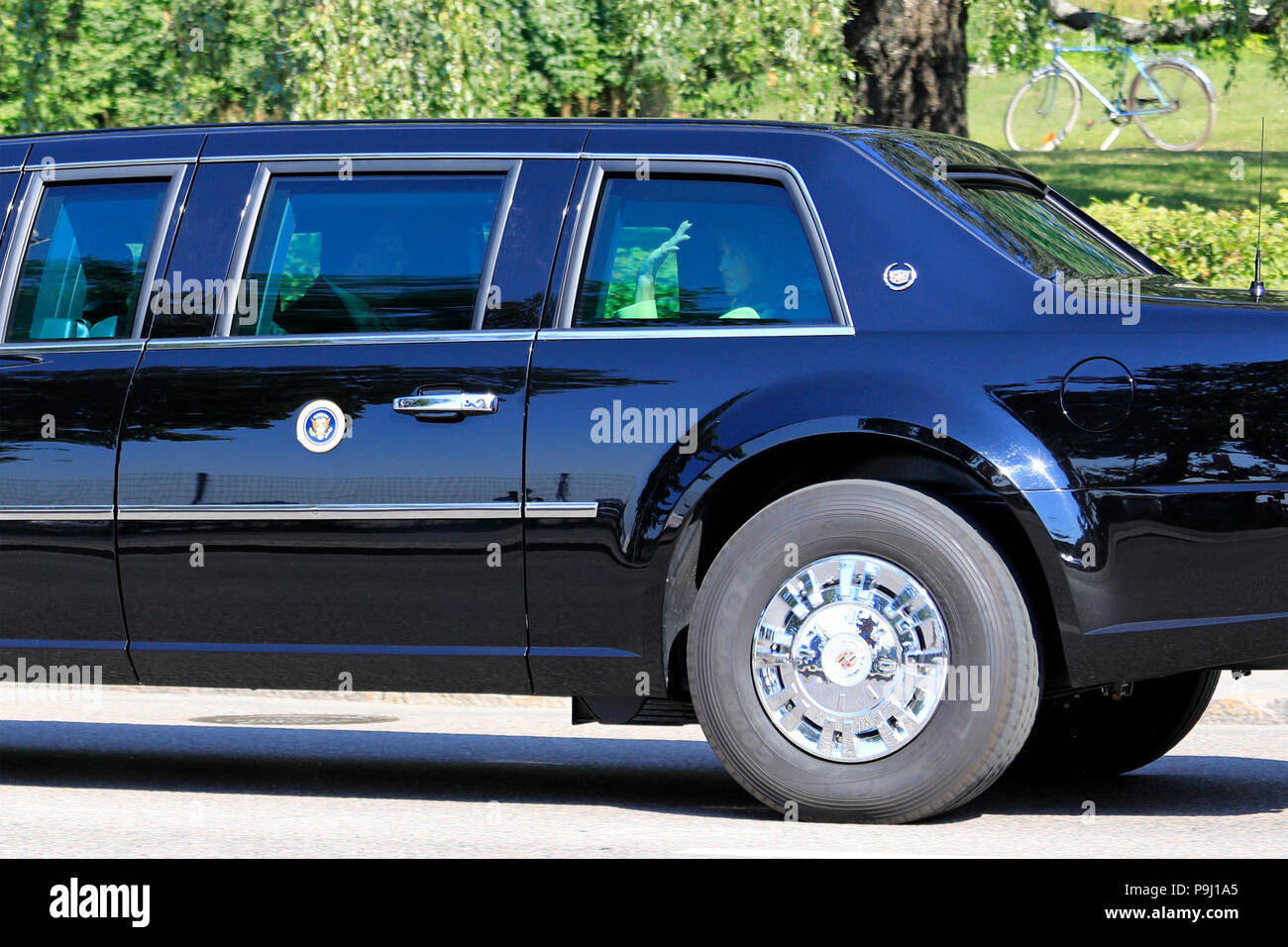 Helsinki, Finland. July 15, 2018.  First Lady Melania Trump waves from the limousine on the day of Helsinki 2018 meeting. Credit: Taina Sohlman/Alamy Stock Photo