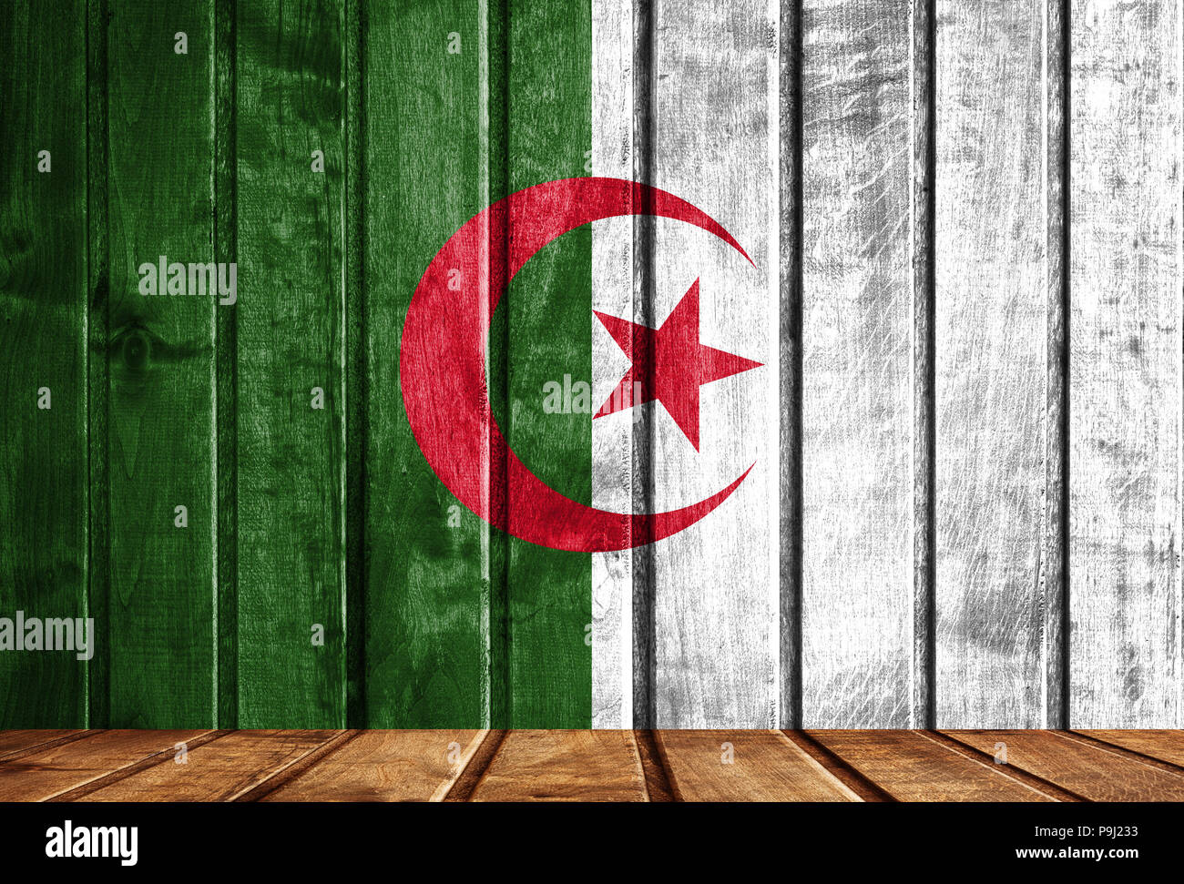 Wooden background with a flag of Algeria Stock Photo - Alamy