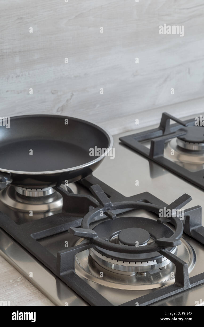 New Design Of Built In Oven And Cooker In The Kitchen Stock Photo