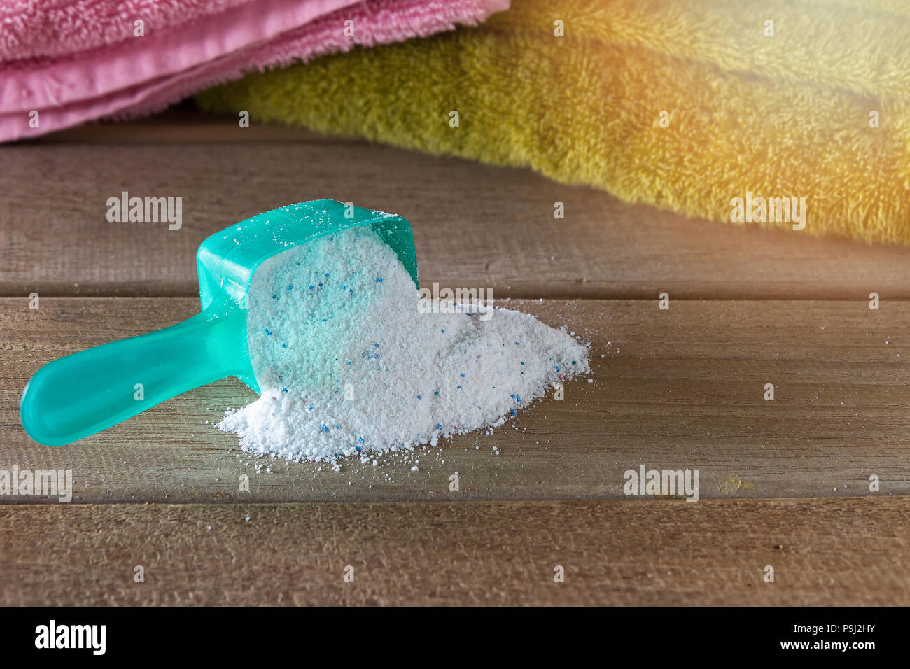 https://c8.alamy.com/comp/P9J2HY/detergent-or-washing-powder-in-measuring-spoon-P9J2HY.jpg