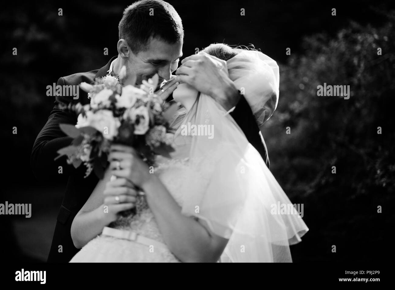 Beautiful wedding couple walking Black and White Stock Photos & Images ...