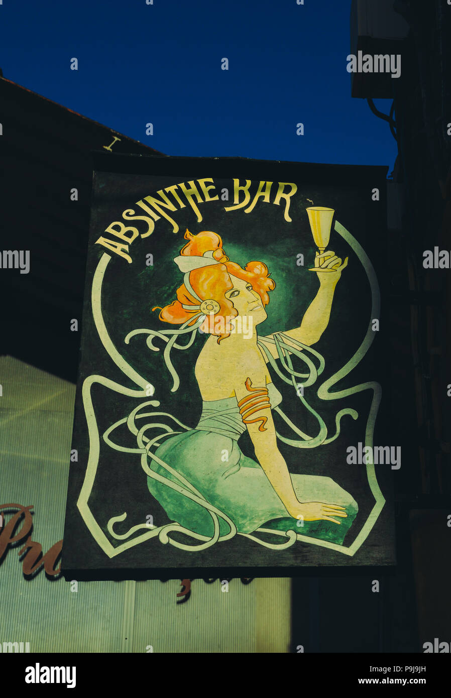 Vintage wooden sign for an absinthe shop Stock Photo