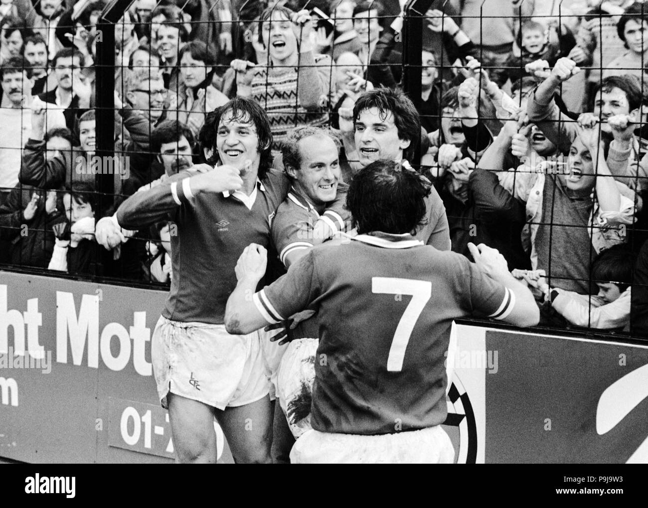 Leicester City's goalscorer Ian Wilson (centre) is congratulated by (L-R) Gary Lineker, Steve Lynex (No 7) and Alan Smith in front of jubilant Leicester City supporters. Leicester beat Fulham 1-0 at Craven Cottage. Stock Photo