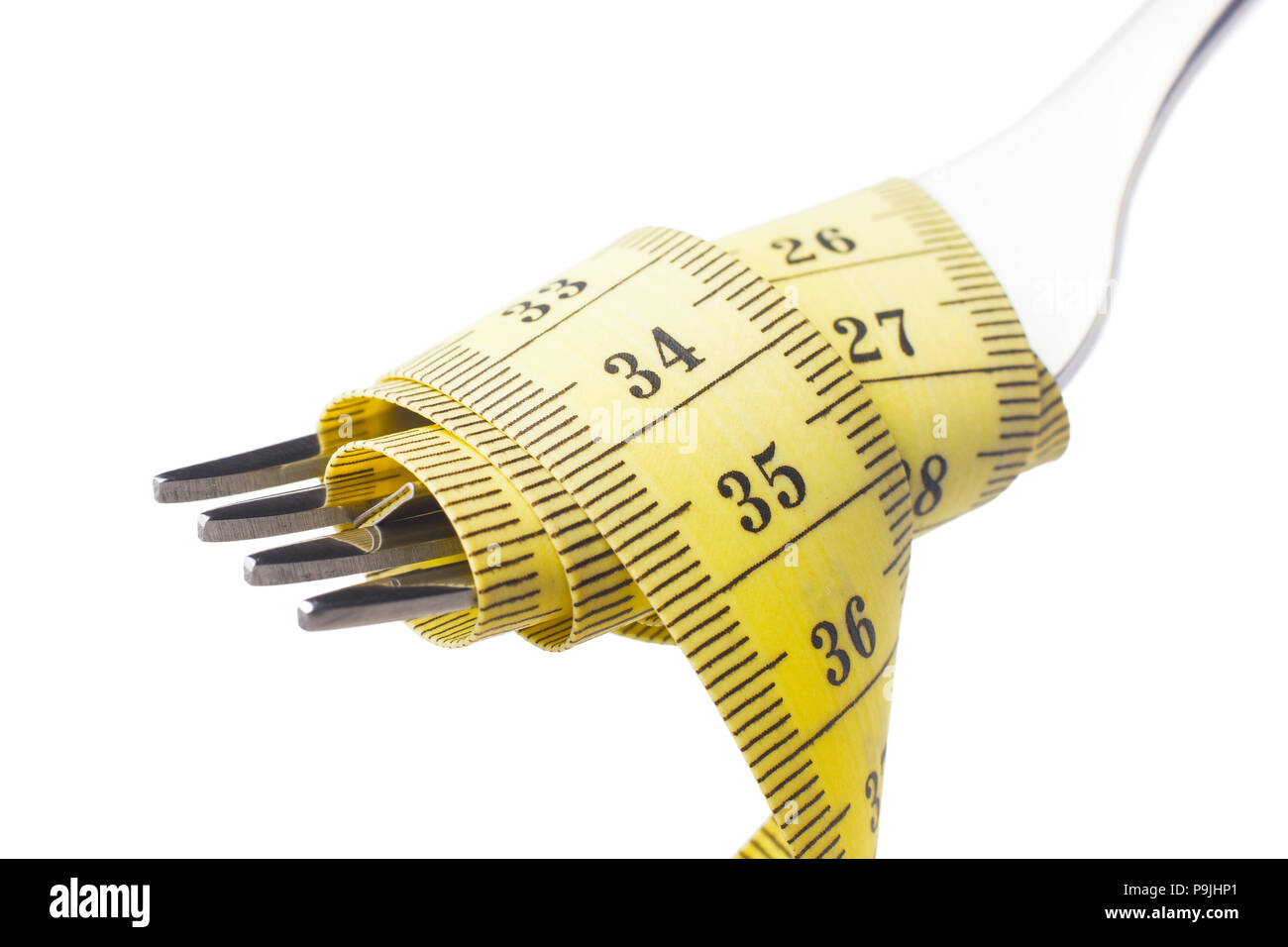 Diet concept, measuring tape looks like pasta put on fork, on white