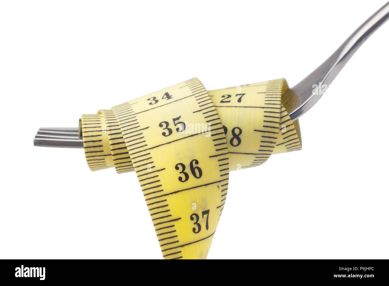 Diet concept, measuring tape looks like pasta put on fork, on white