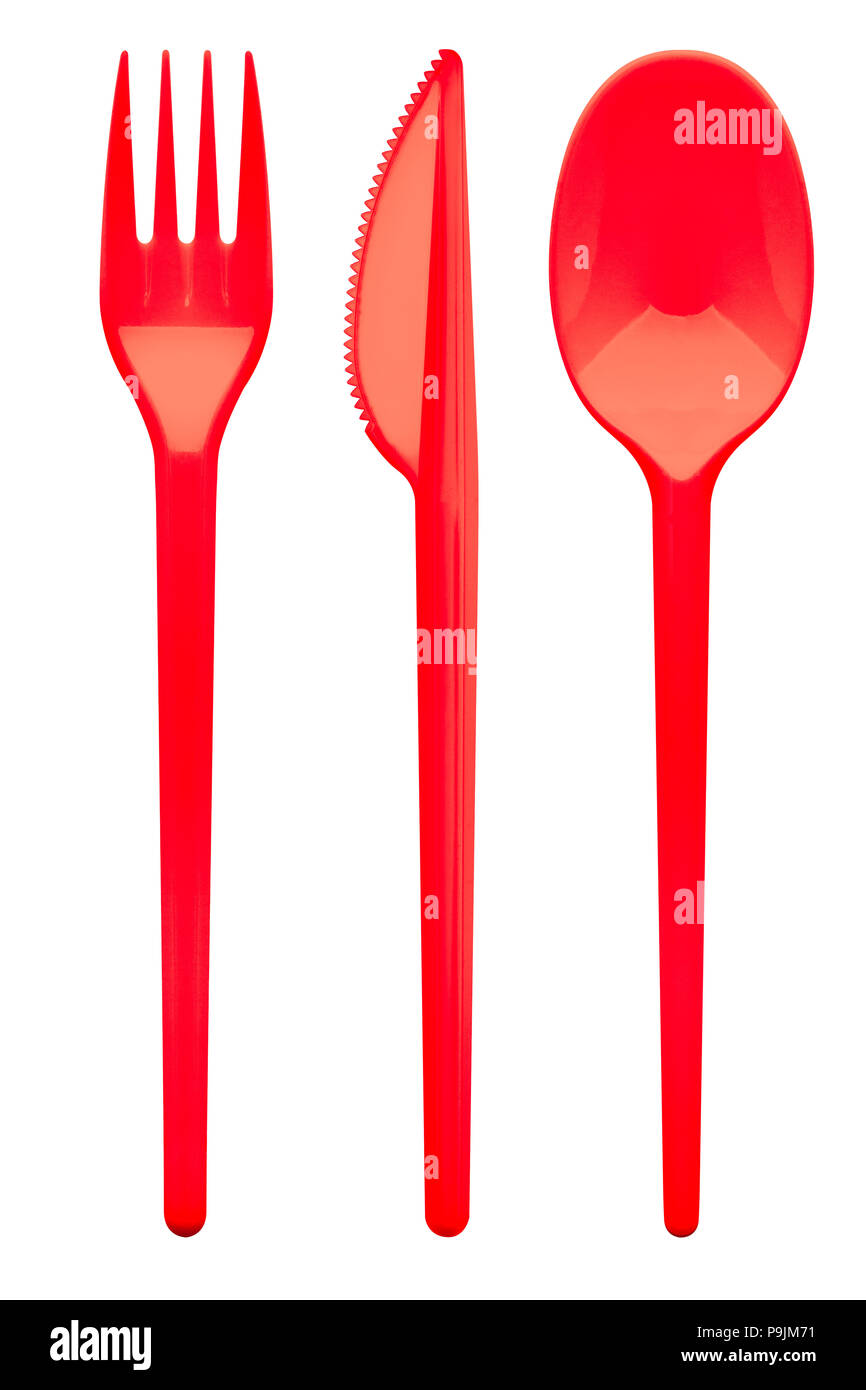Disposable red plastic fork, knife, spoon, clipping path, isolated on white background Stock Photo